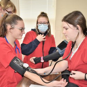 CCCTC Health Occupations Technology Students Learning Importance of Correct Blood Pressure Readings