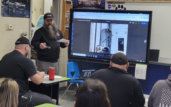 Collision Repair Instructor Shares Best Practices With Staff